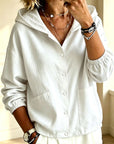 Chaqueta de mujer con capucha y botones, de corte holgado – un estilo desenfadado y cómodo, ideal para combinar con otras prendas