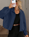 Chaqueta de mujer con cuello alto y cremallera – Corte holgado y cordón en el bajo. Estilo informal para otoño-invierno