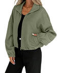 Chaqueta de mujer con cuello alto y cremallera – Corte holgado y cordón en el bajo. Estilo informal para otoño-invierno