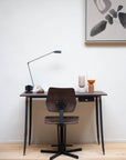 Minimalistyczna regulowana lampa stołowa w stylu przemysłowym